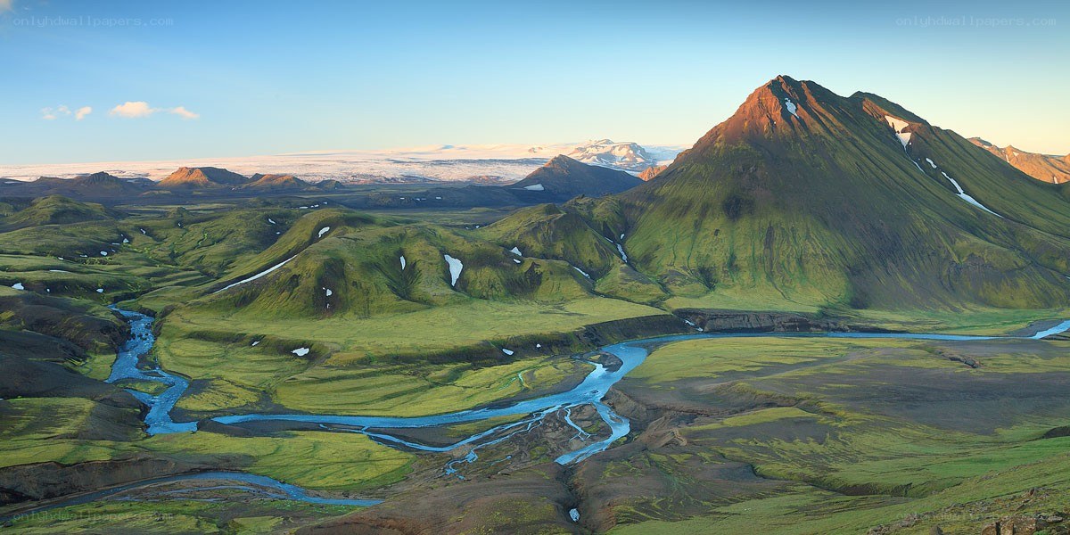 Green valley with river and mountains