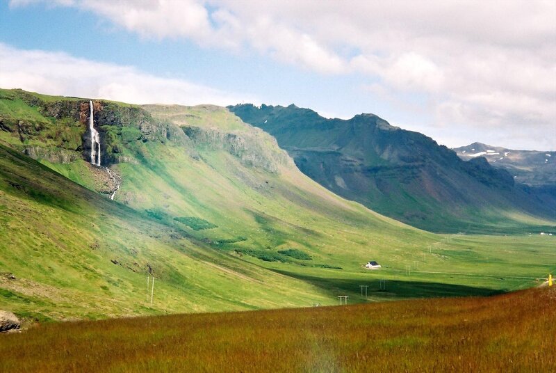 Green valley with waterfall