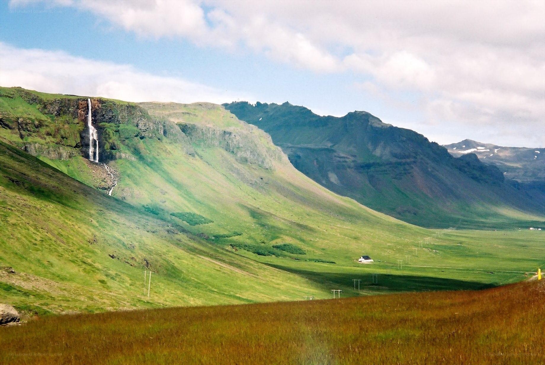 Green valley with waterfall