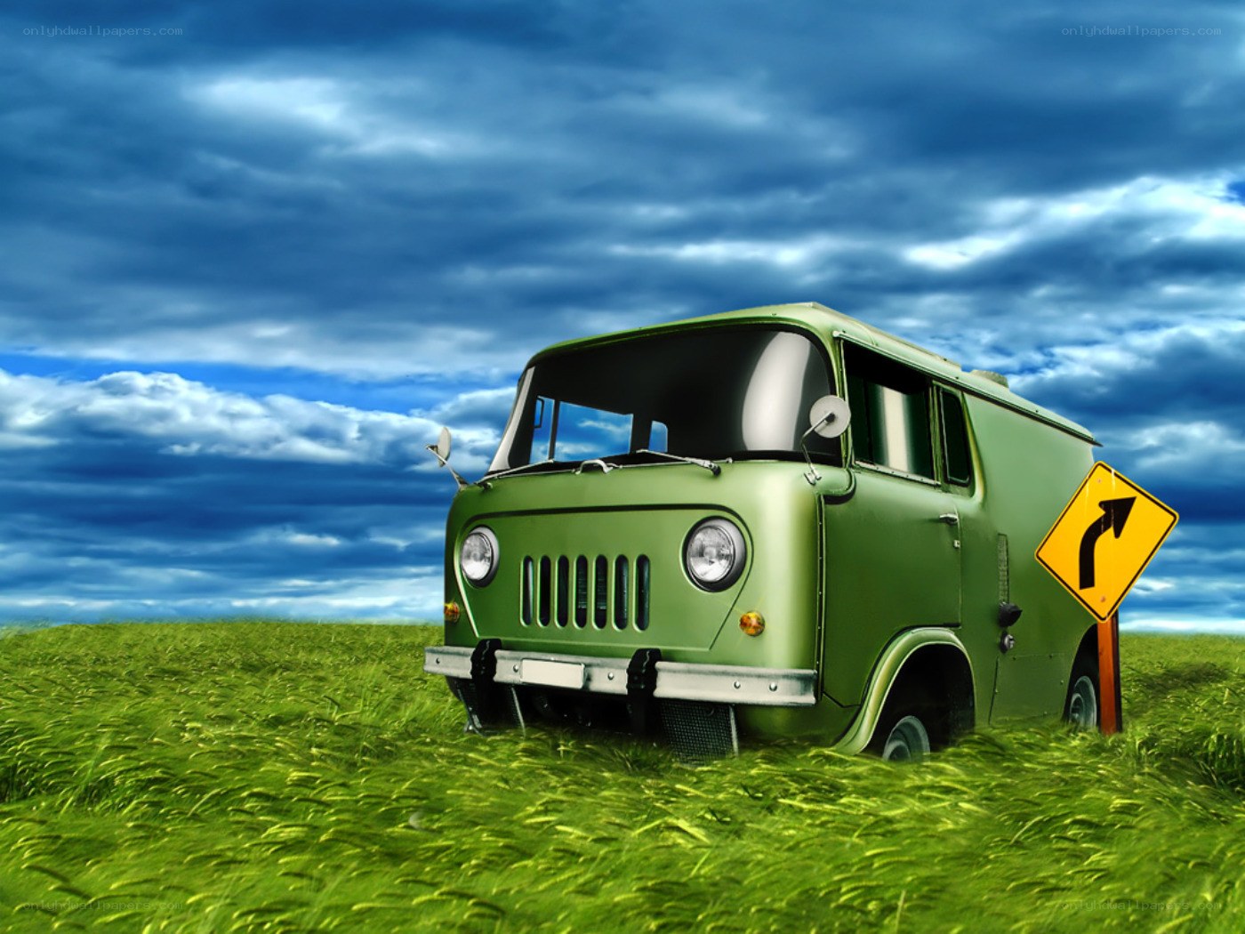 Green van in a grassy field
