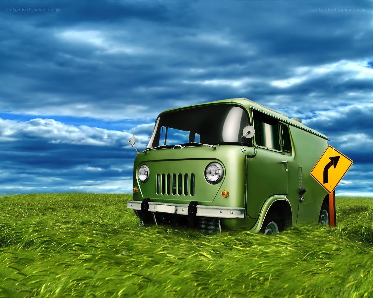 Green van in a grassy field