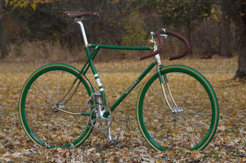 green vintage bicycle in autumn