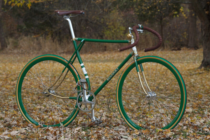 green vintage bicycle in autumn