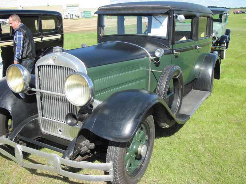 Green Vintage Car — Calm, Afternoon, Photograph, Man