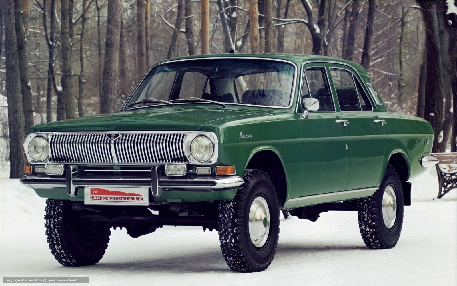 Green vintage car in winter