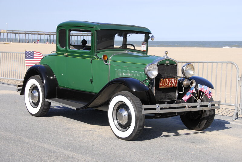 Green Vintage Car — Serene, Afternoon, Photograph, American Flags