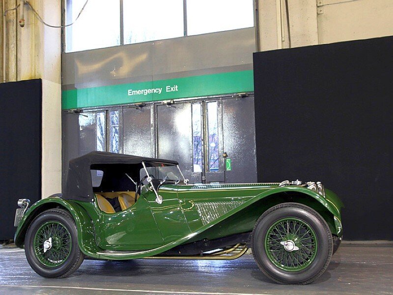 Green vintage convertible car