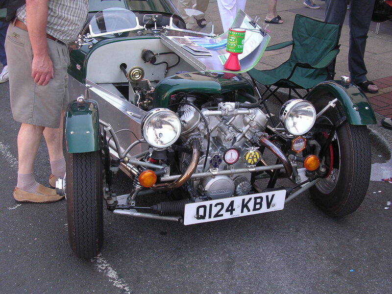 Green vintage race car on display