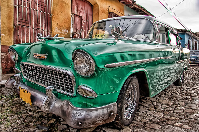 Green vintage taxi in Havana