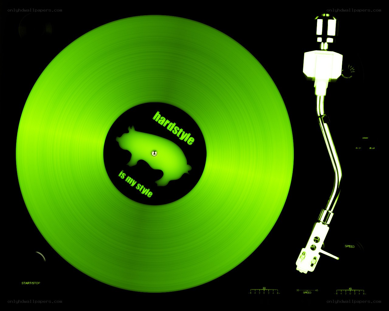 green vinyl record on turntable