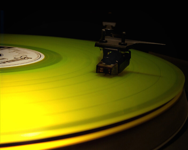 green vinyl record playing