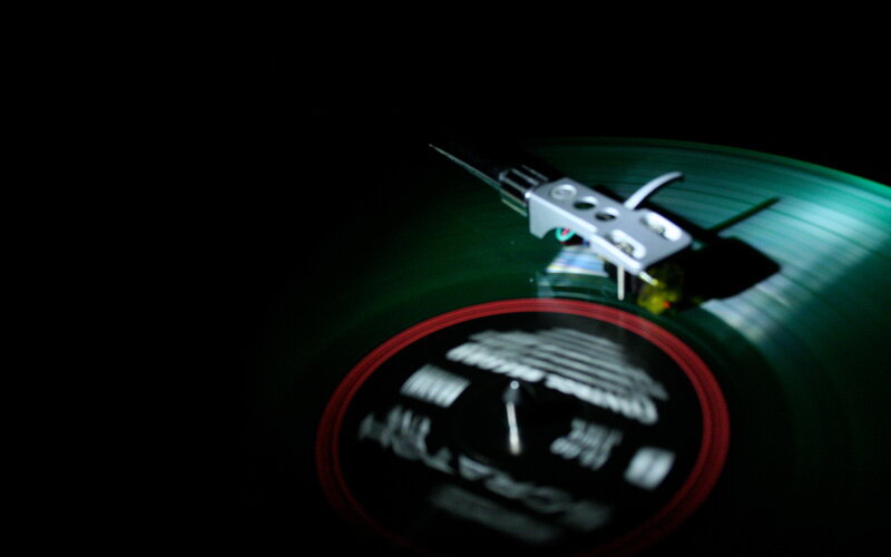 green vinyl record playing