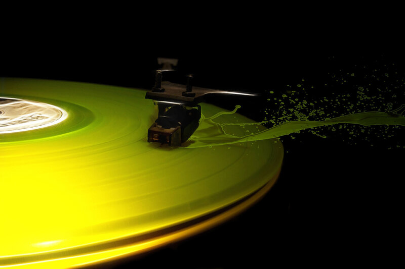 green vinyl record spinning