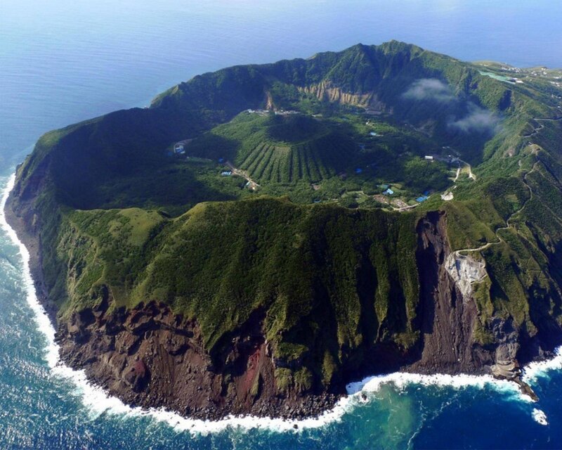 Green Volcanic Island — Serene, Afternoon, Photograph, Ocean, Cliffs