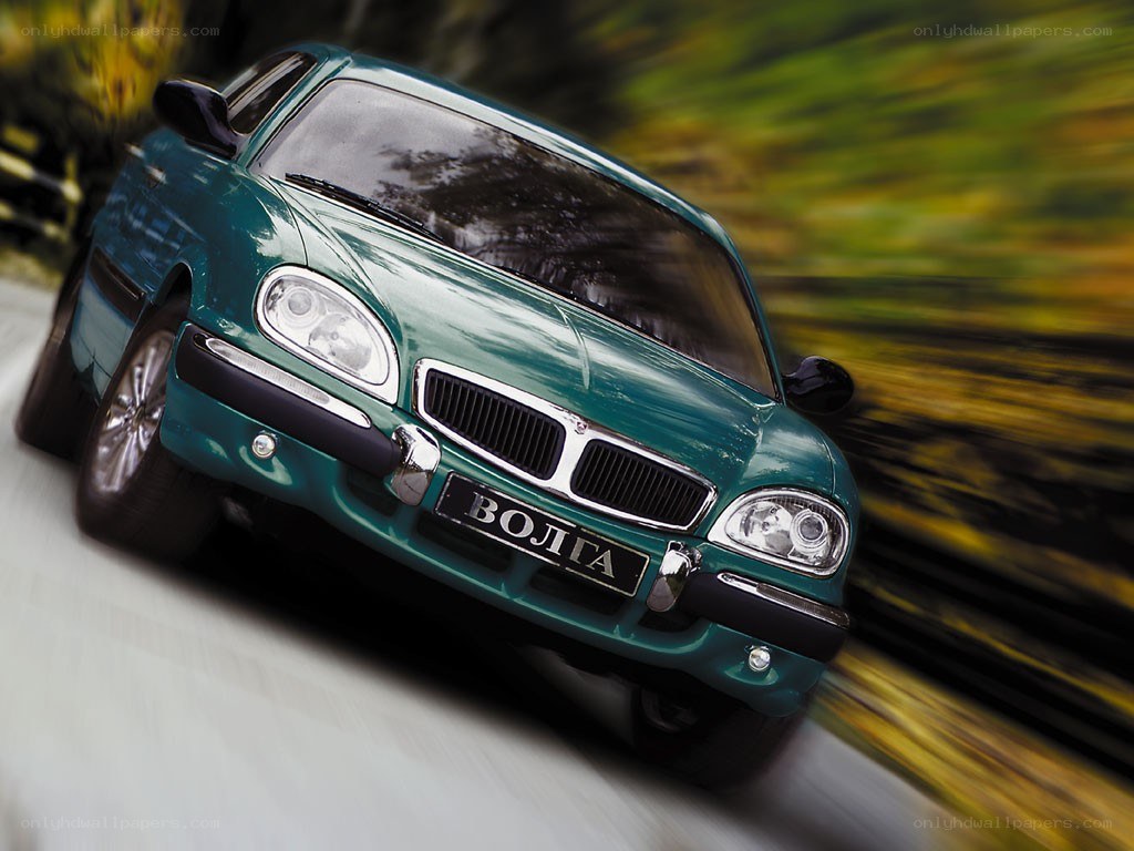 Green Volga car in motion
