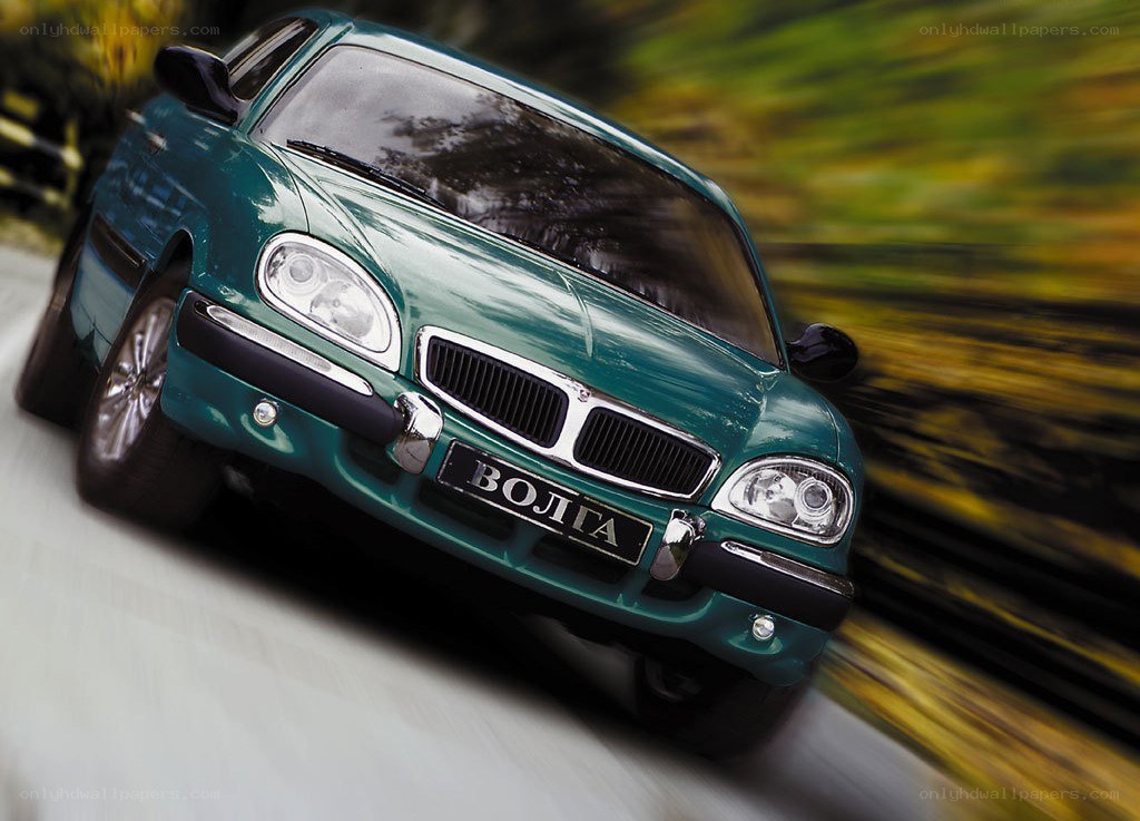 Green Volga car in motion