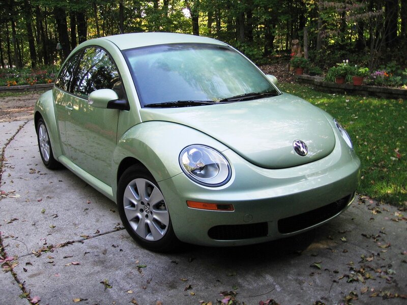 Green Volkswagen Beetle parked