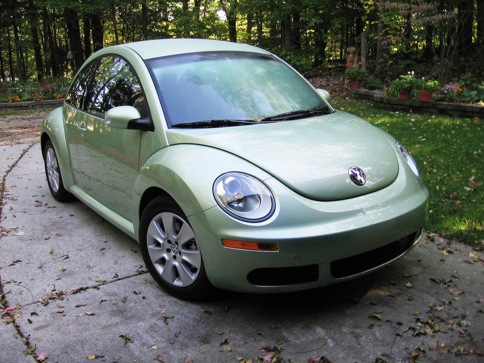 Green Volkswagen Beetle parked