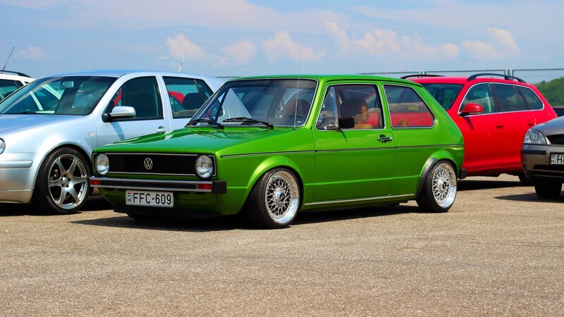 Green Volkswagen Golf — Calm, Afternoon