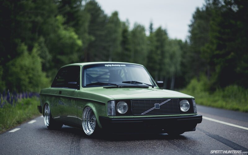 Green Volvo Car — Calm, Summer