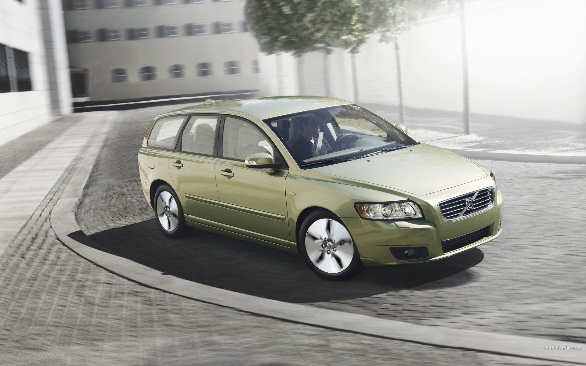 Green Volvo station wagon