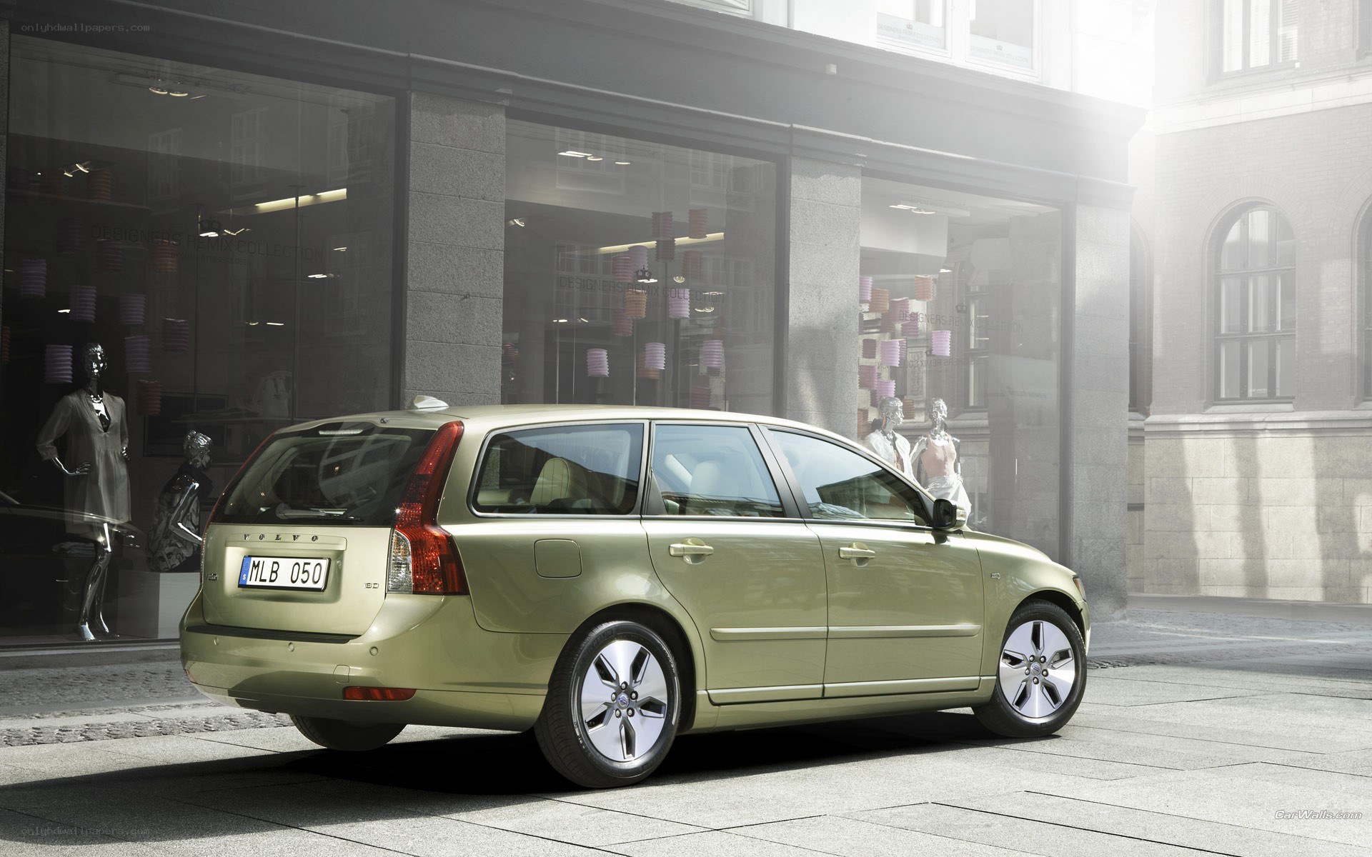 Green Volvo station wagon