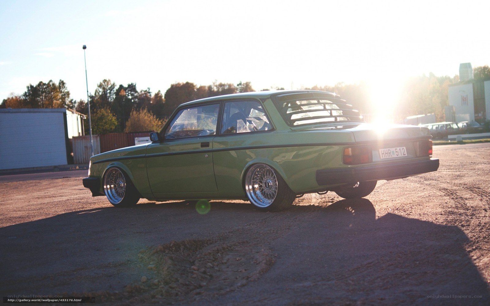 green volvo with custom wheels