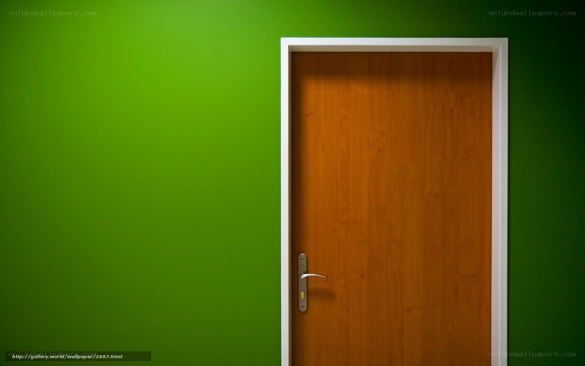 green wall with wooden door