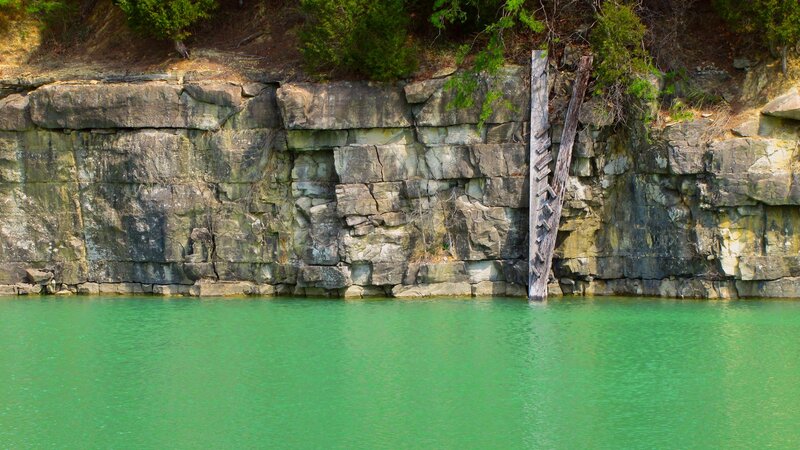 green water and rock cliff