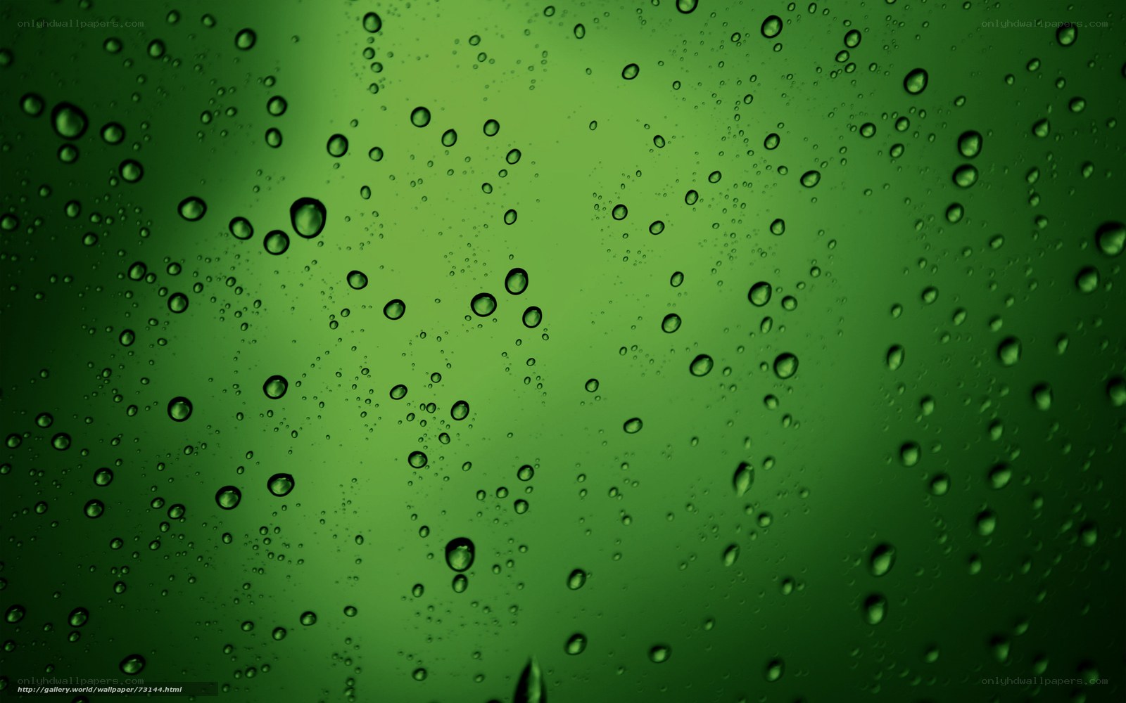 green water droplets on glass