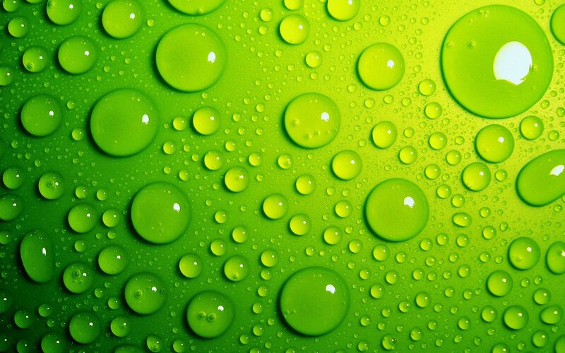 green water droplets on surface