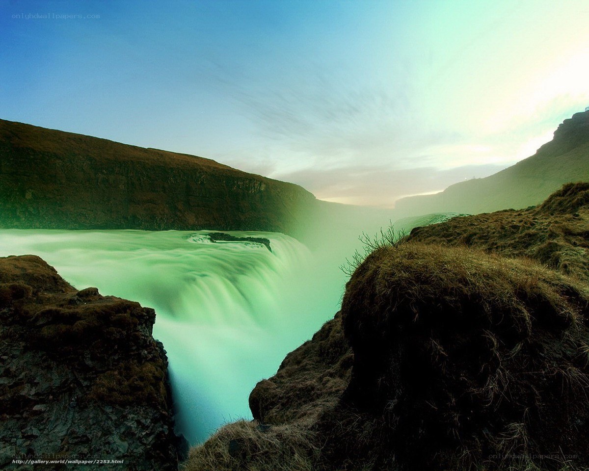 Green waterfall at dusk