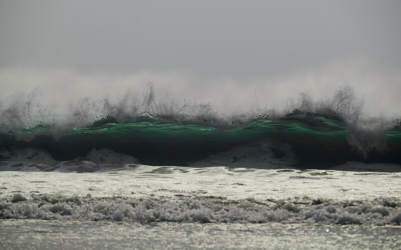 Green Wave Breaking