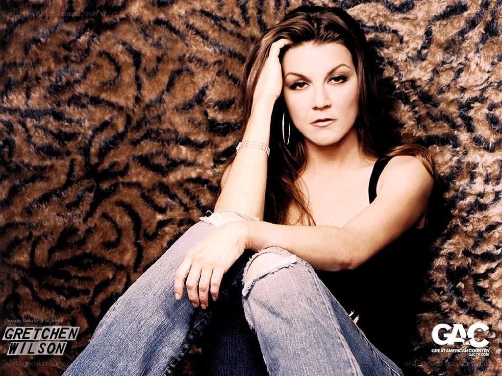 Gretchen Wilson on a tiger rug