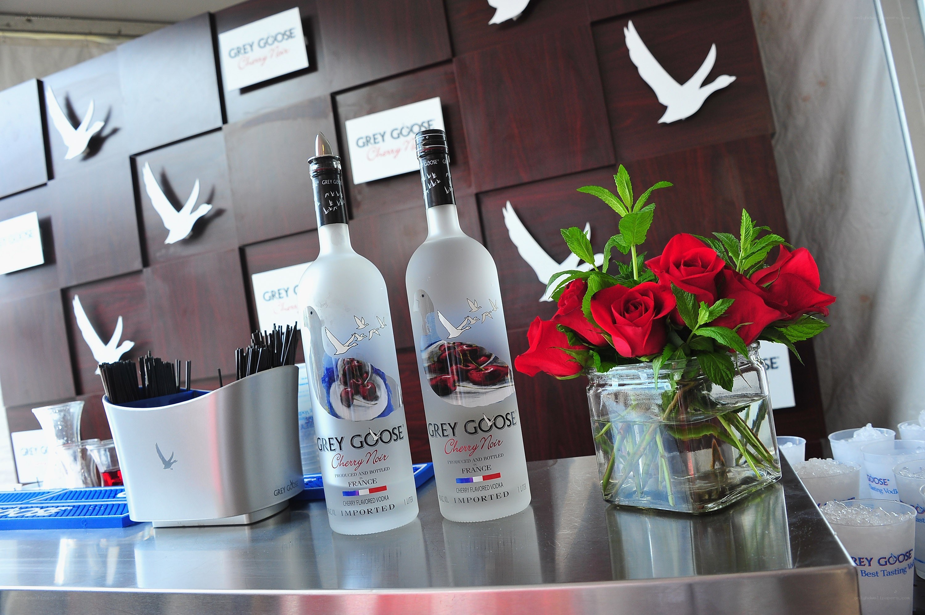 Grey Goose vodka bottles on bar