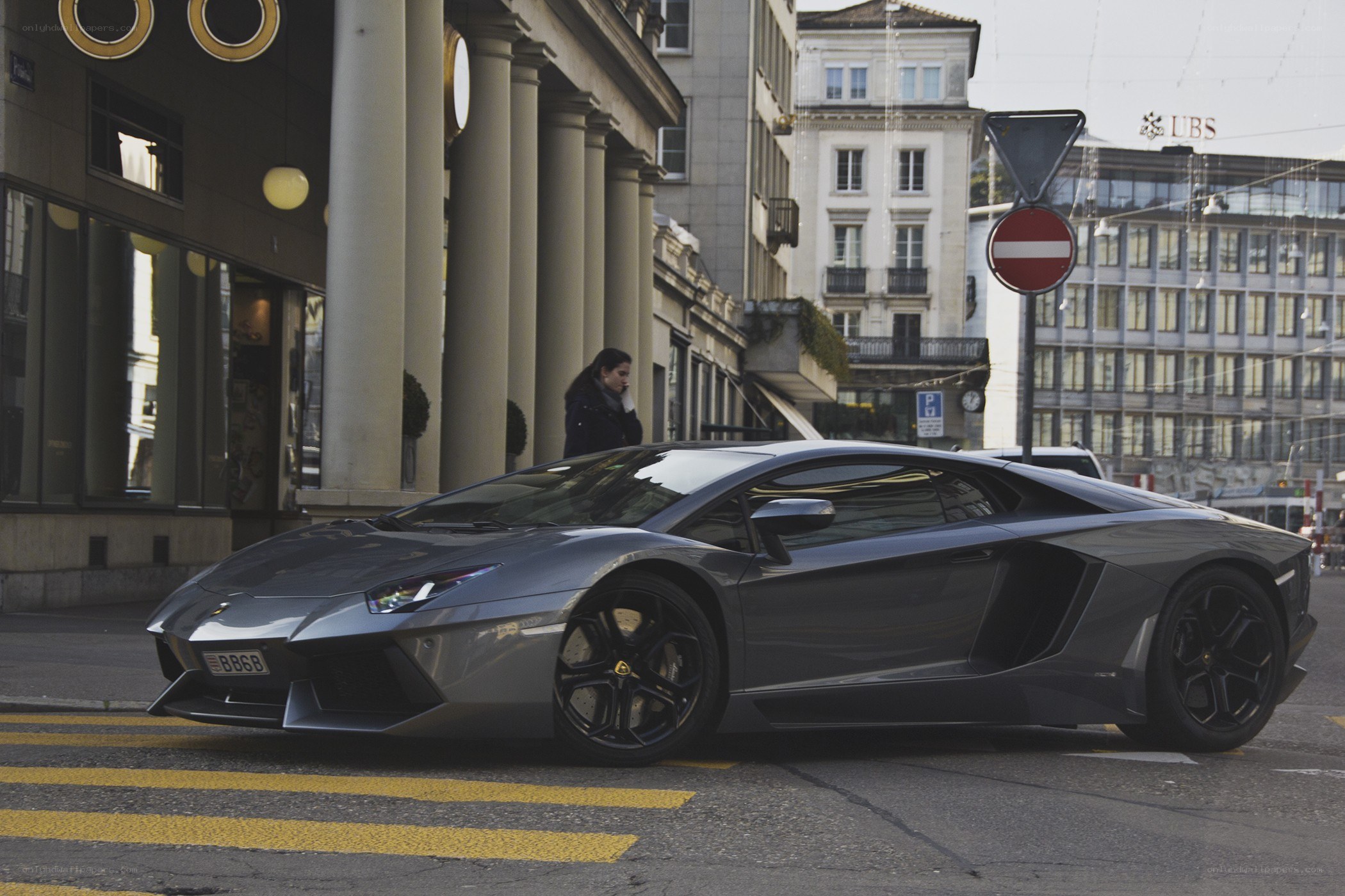 Grey Lamborghini on city street