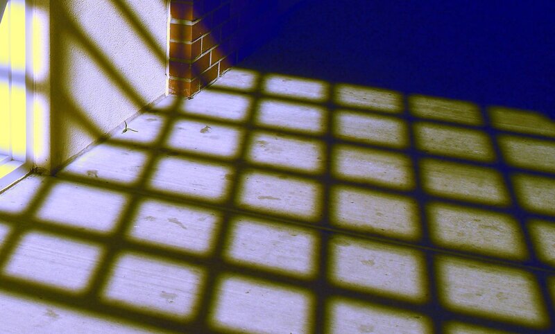 grid shadow on floor