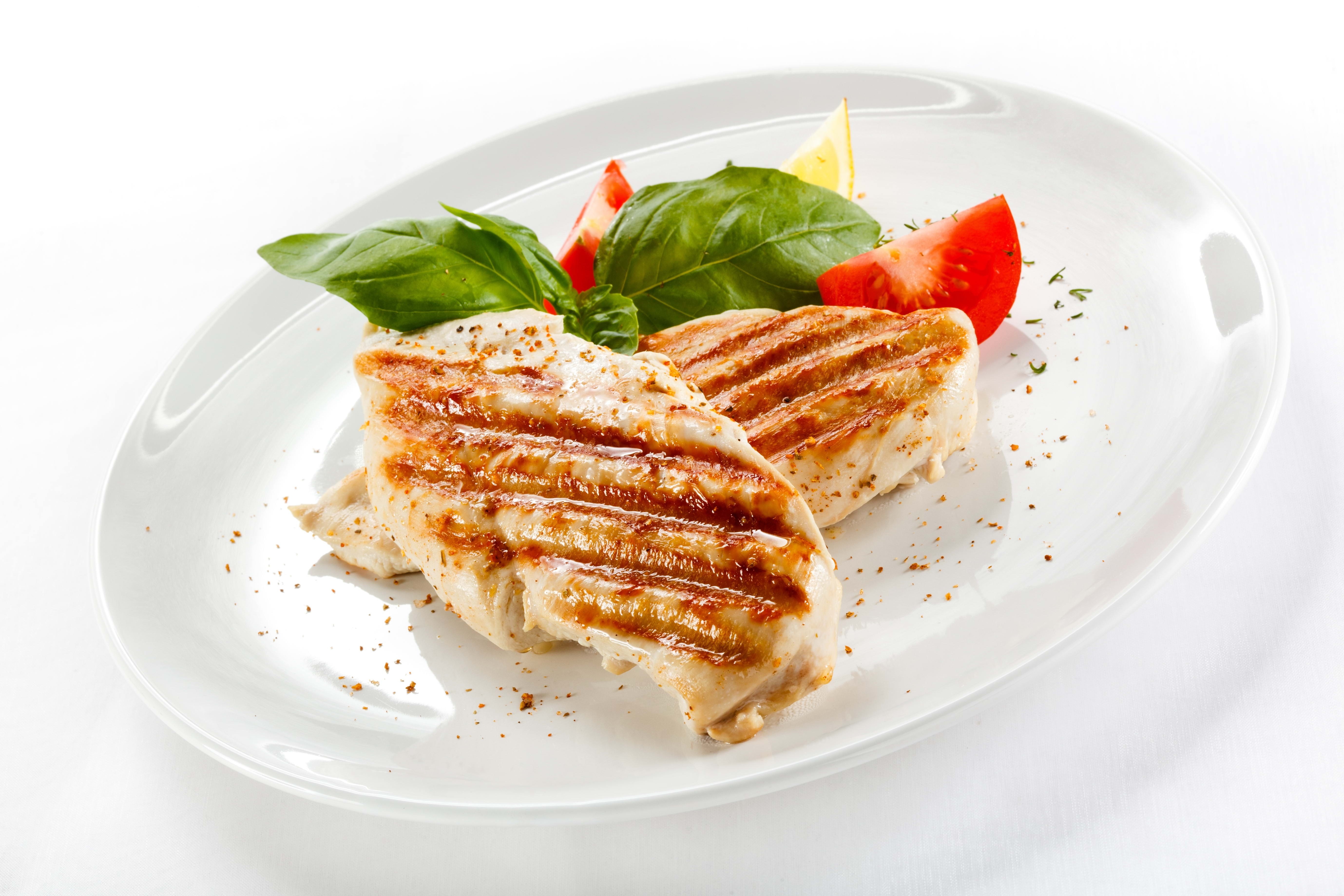 Grilled chicken breast with garnish