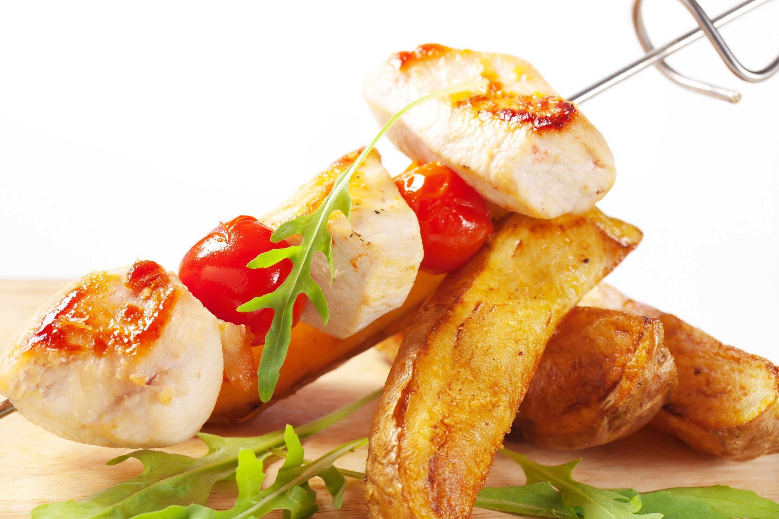 Grilled chicken skewer with potatoes