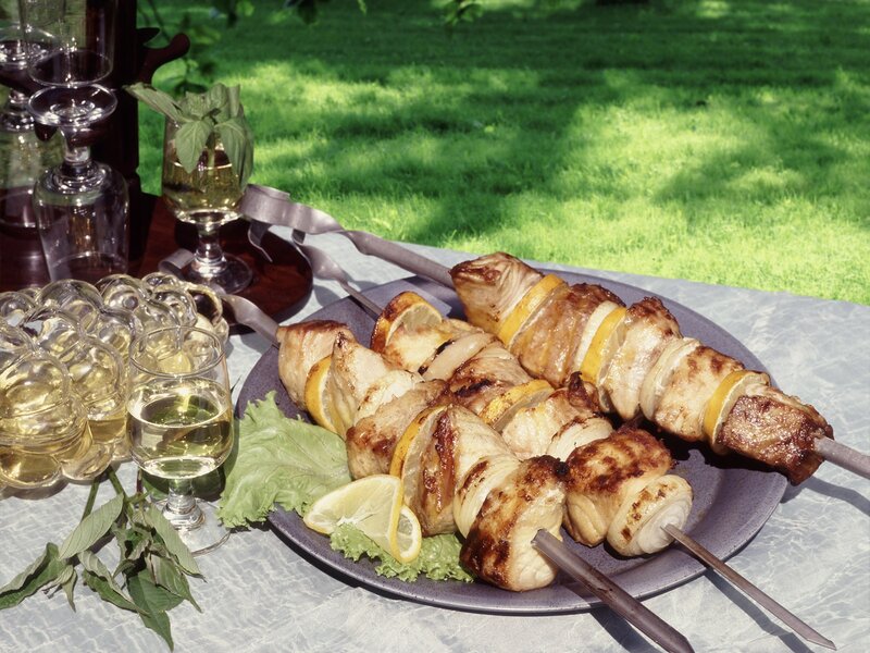 Grilled chicken skewers outdoors