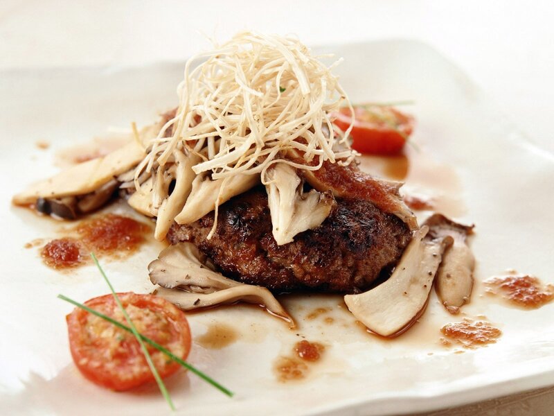 Grilled meat patty with mushrooms