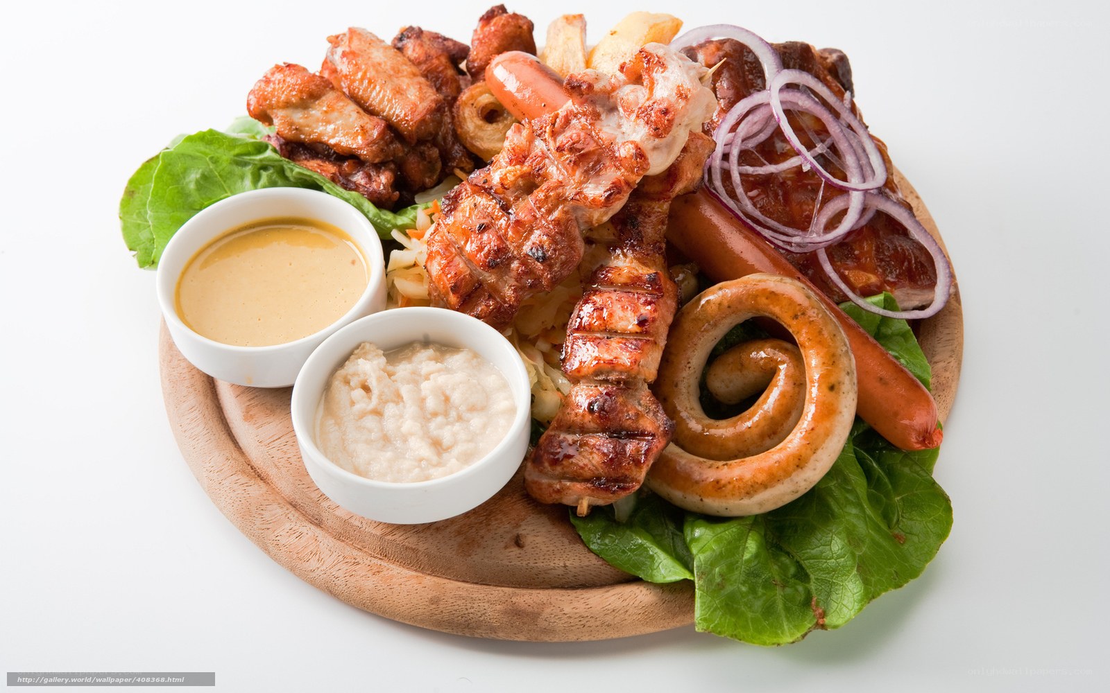 grilled meat platter with sauces