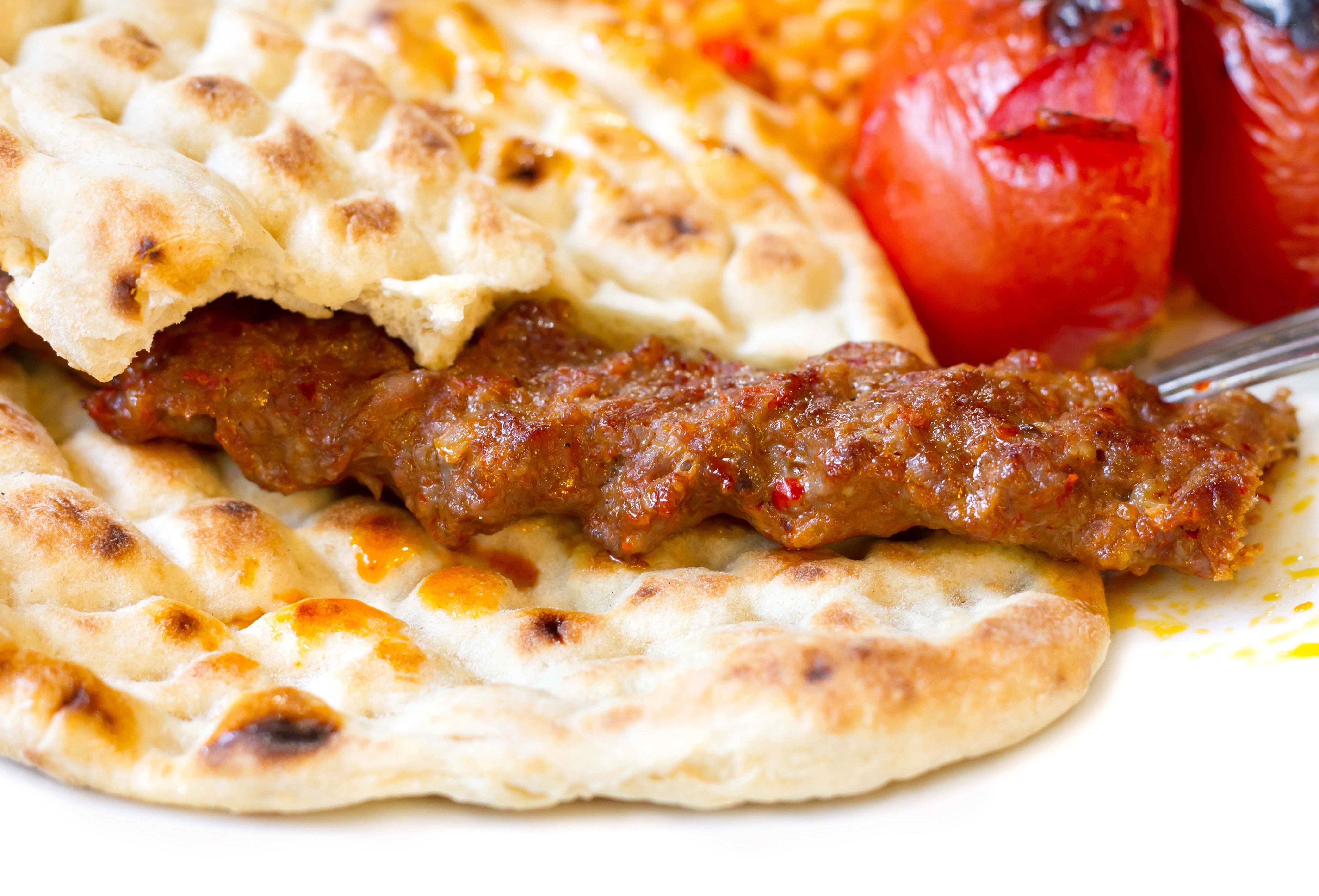 Grilled meat skewer with naan