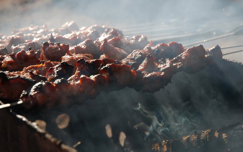 Grilled meat skewers on a barbecue