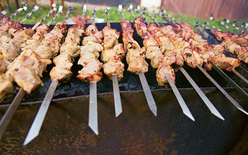 Grilled meat skewers on a barbecue