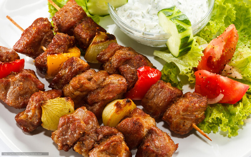 Grilled meat skewers with tzatziki