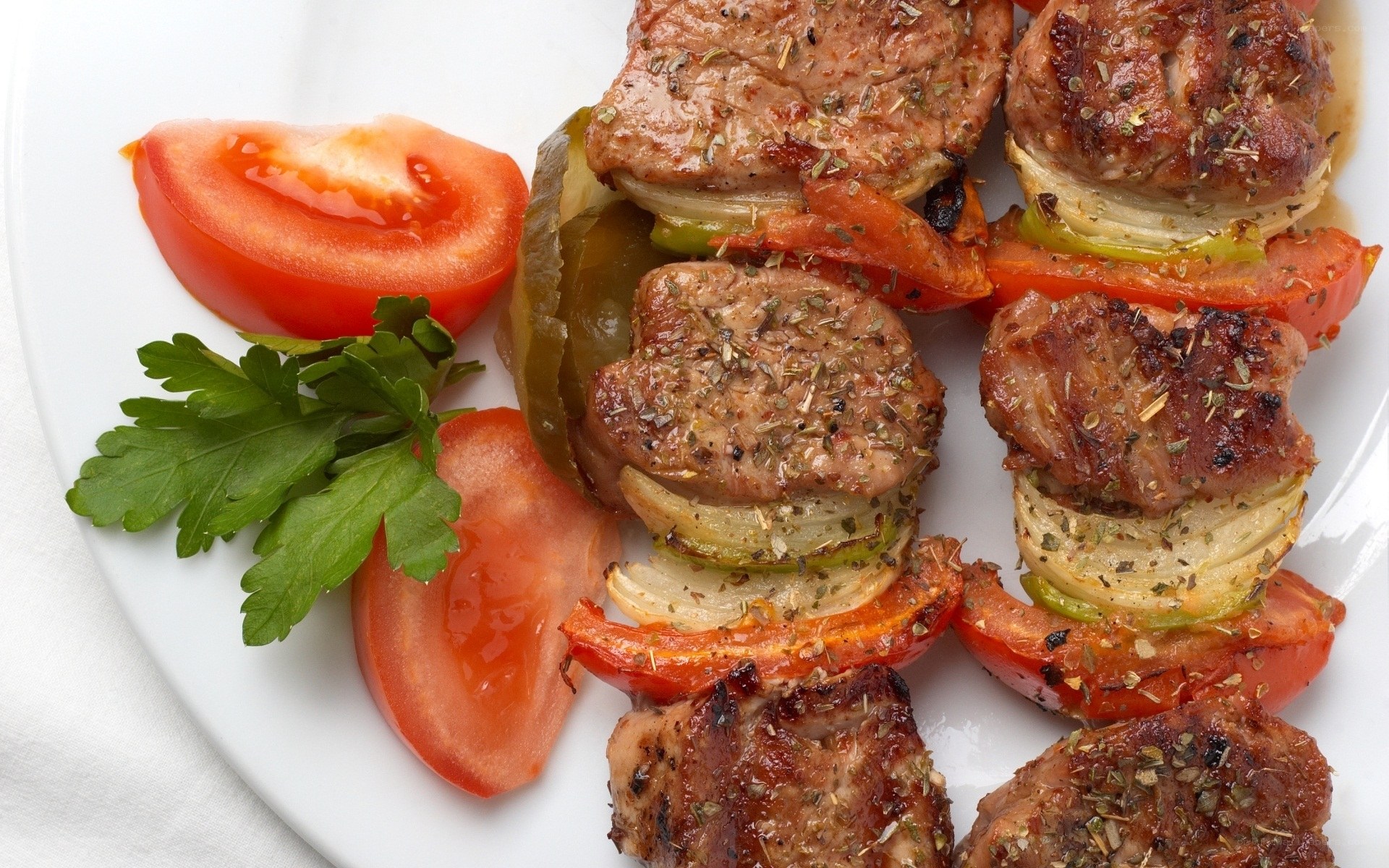 grilled meat skewers with vegetables