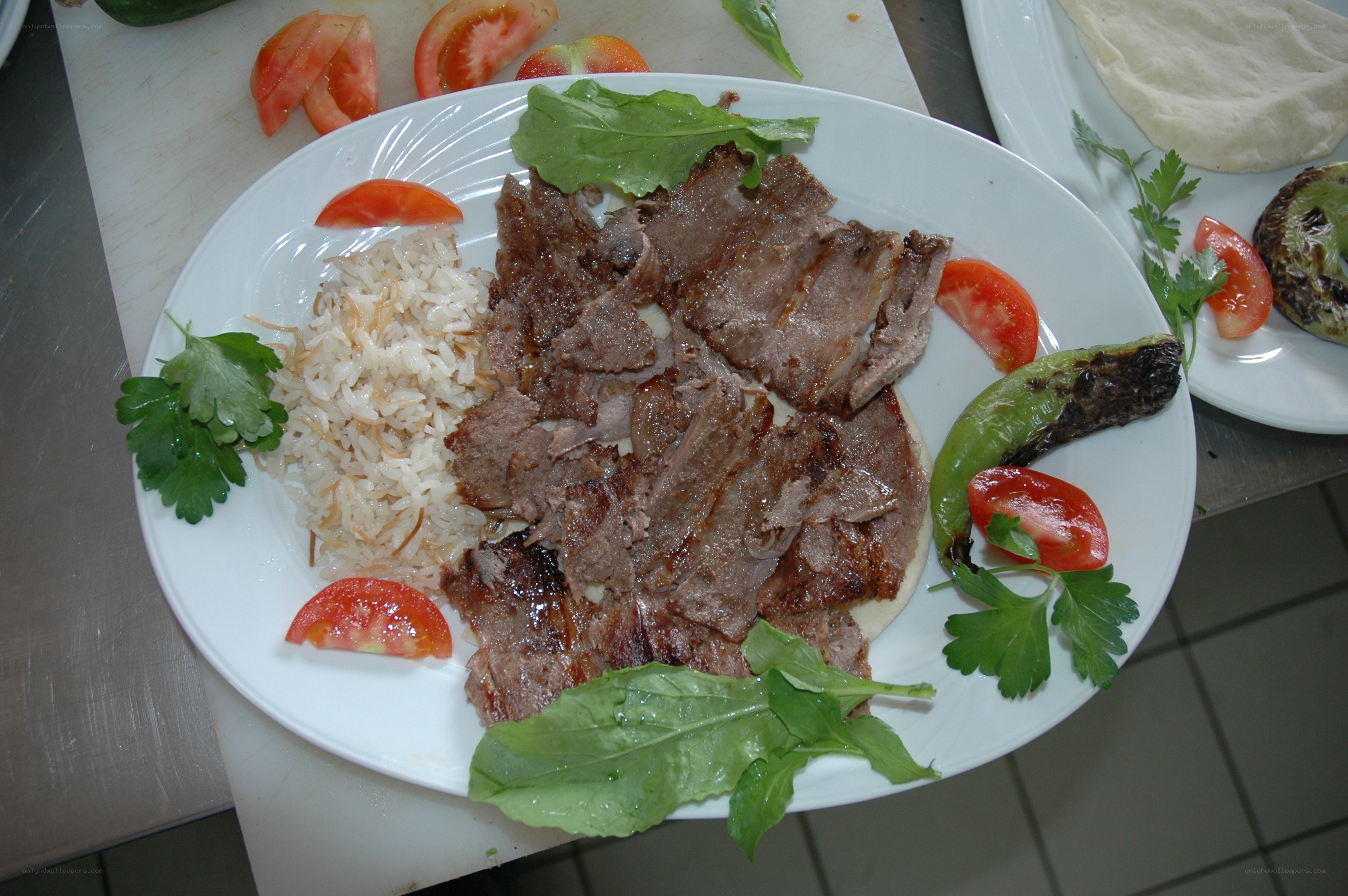 Grilled meat with rice and vegetables
