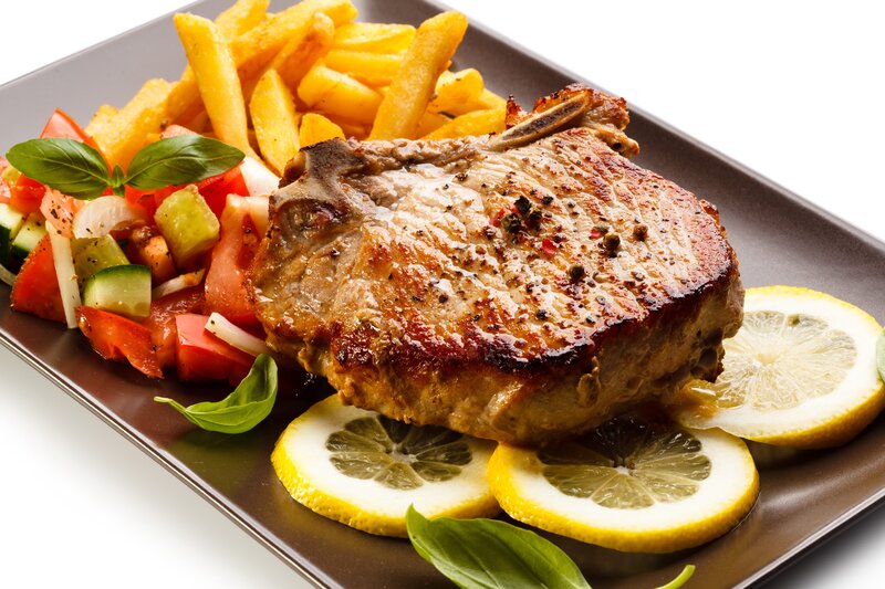 Grilled pork chop with fries