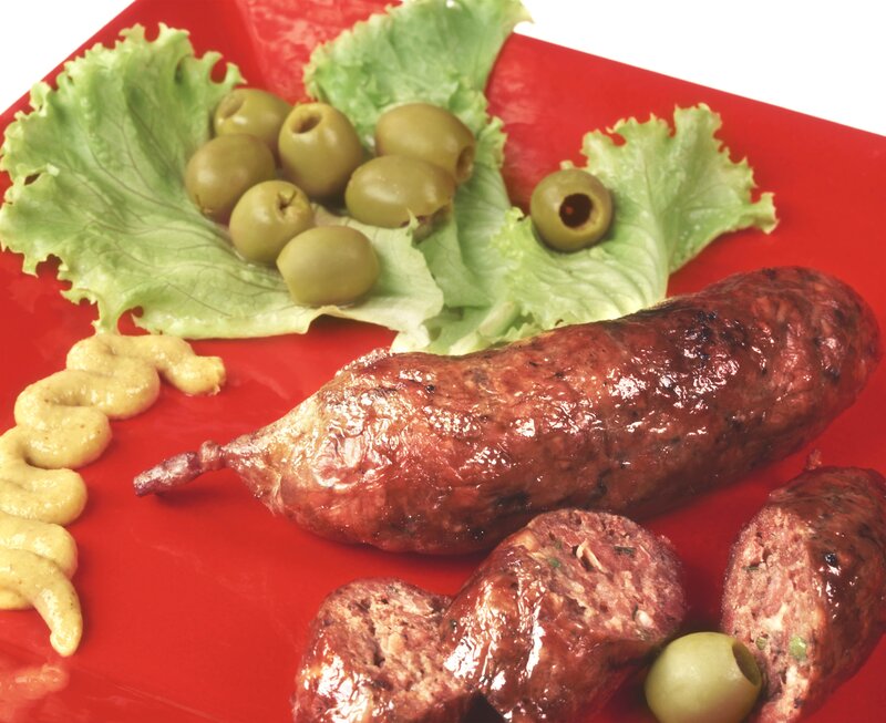 Grilled sausage with olives and mustard